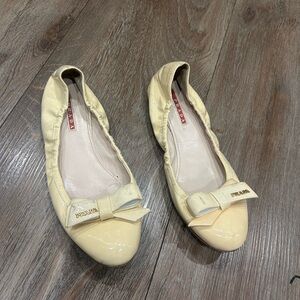 Prada Cream Patent Leather Bow Flats